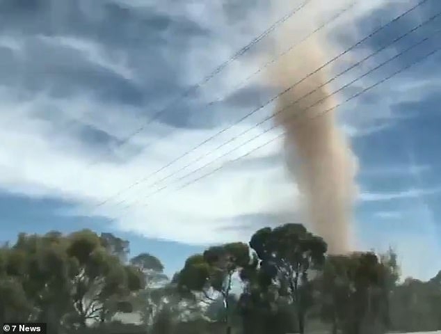 7029690-6462081-A_dust_devil_pictured_recorded_in_Two_Wells_north_of_Adelaide_on.jpg